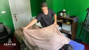 ماساژ حوله گرم